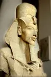 10075